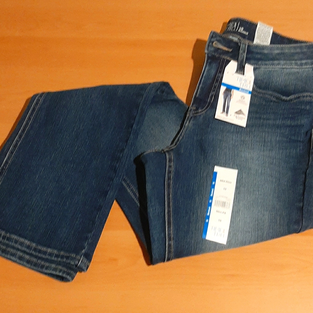 Mid Rise Boot cut Jean's